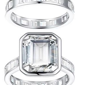 Brand new. Diamonique 14.80 ctw bridal ring set in sterling silver.  Size 6
